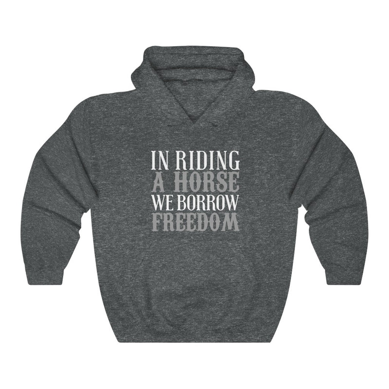 In Riding A Horse Unisex Heavy Blend™ Hoodie