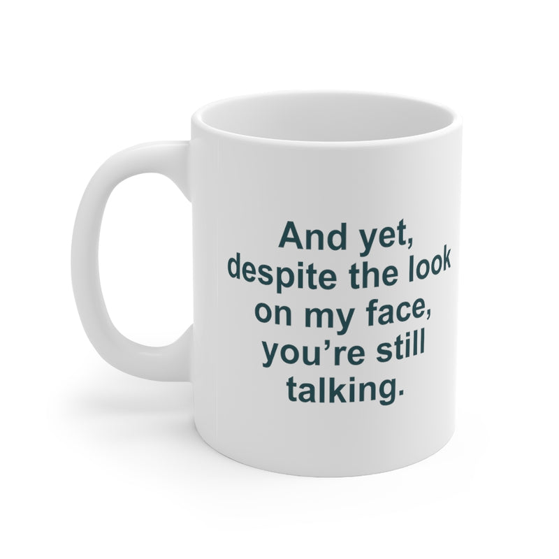 And Yet Despite The Look On My Face - 11oz White Mug